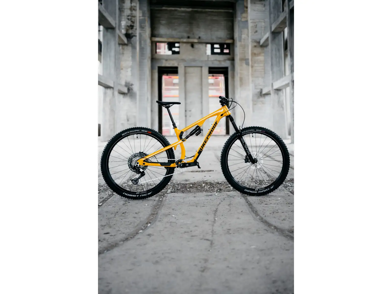 Nukeproof Reactor Alloy Pro 290 Eagle 90 vollgefedertes Fahrrad Yellow