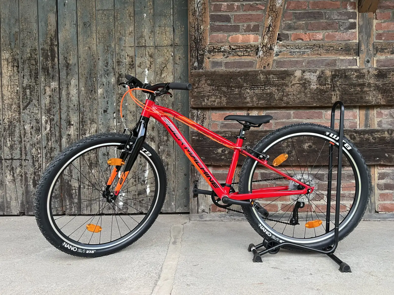 Rock Machine Thunder 27 VB rot/orange Kinder Mountainbike