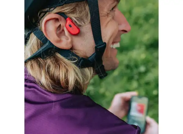 Suunto Wing Kopfhörer mit Ladestation in Lava Rot