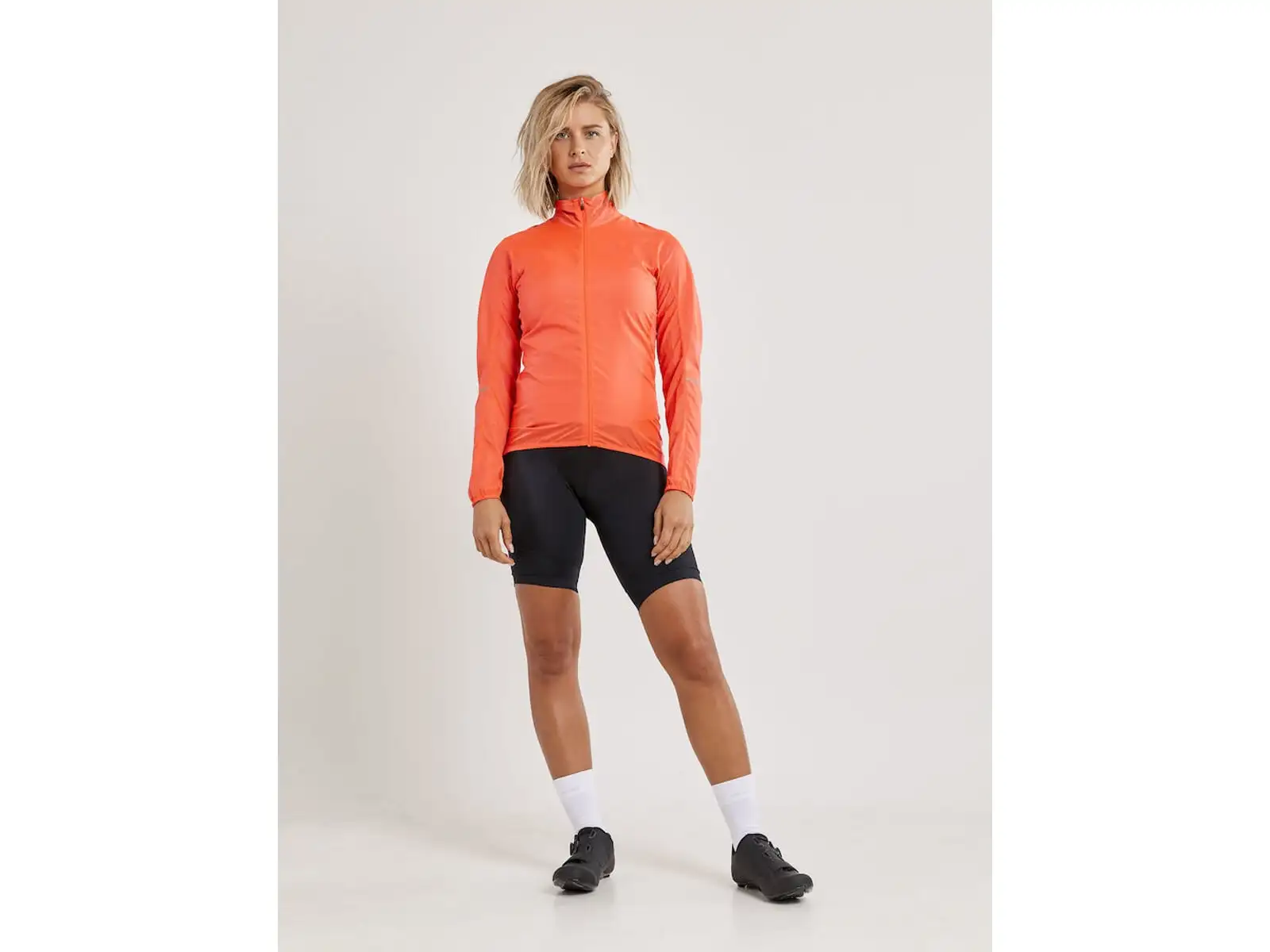 Craft ADV Essence Light Wind Damen Fahrradjacke Orange