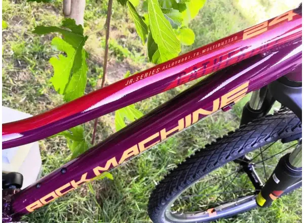 Rock Machine Catherine 24 VB Mountainbike in Gloss Crimson/Orange/Crimson.