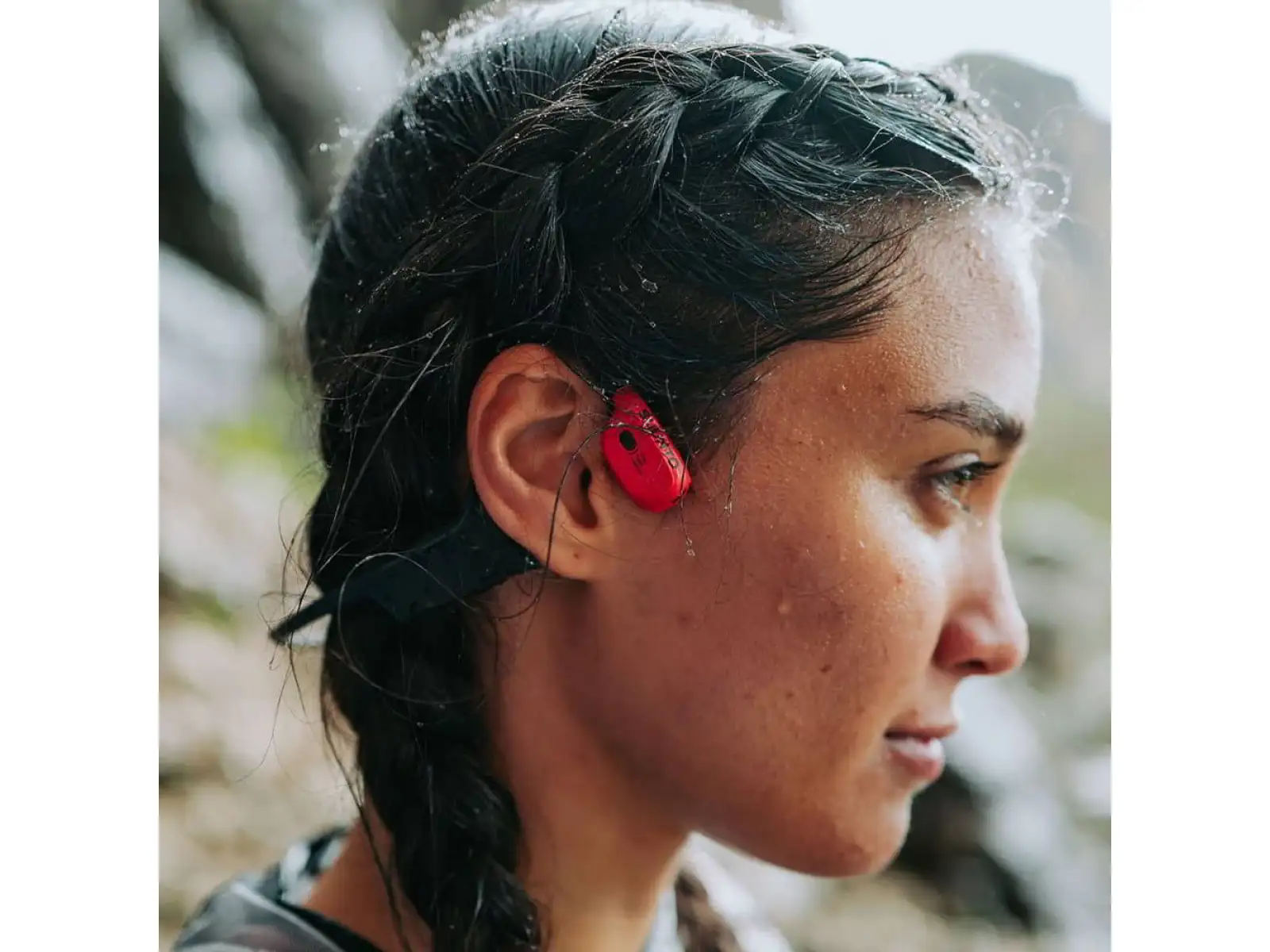 Suunto Wing Kopfhörer mit Ladestation in Lava Rot