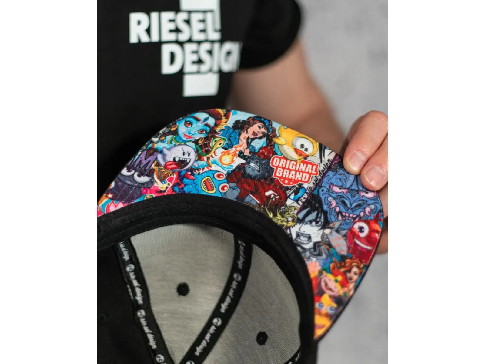 Rie:sel Design Kappe Stickerbomb